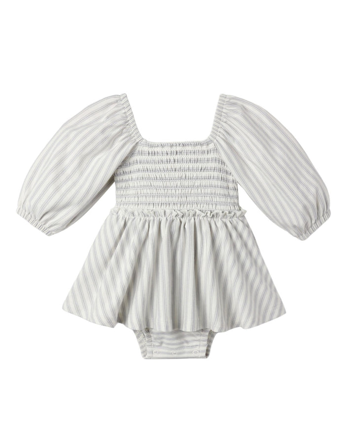 A baby romper with a smocked bodice, puffed sleeves, and a flared ruffle skirt, featuring a light gray and white vertical stripe pattern.