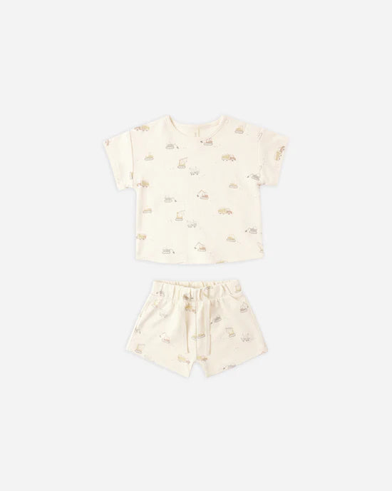 Children's cream-colored outfit with a pattern on a white background