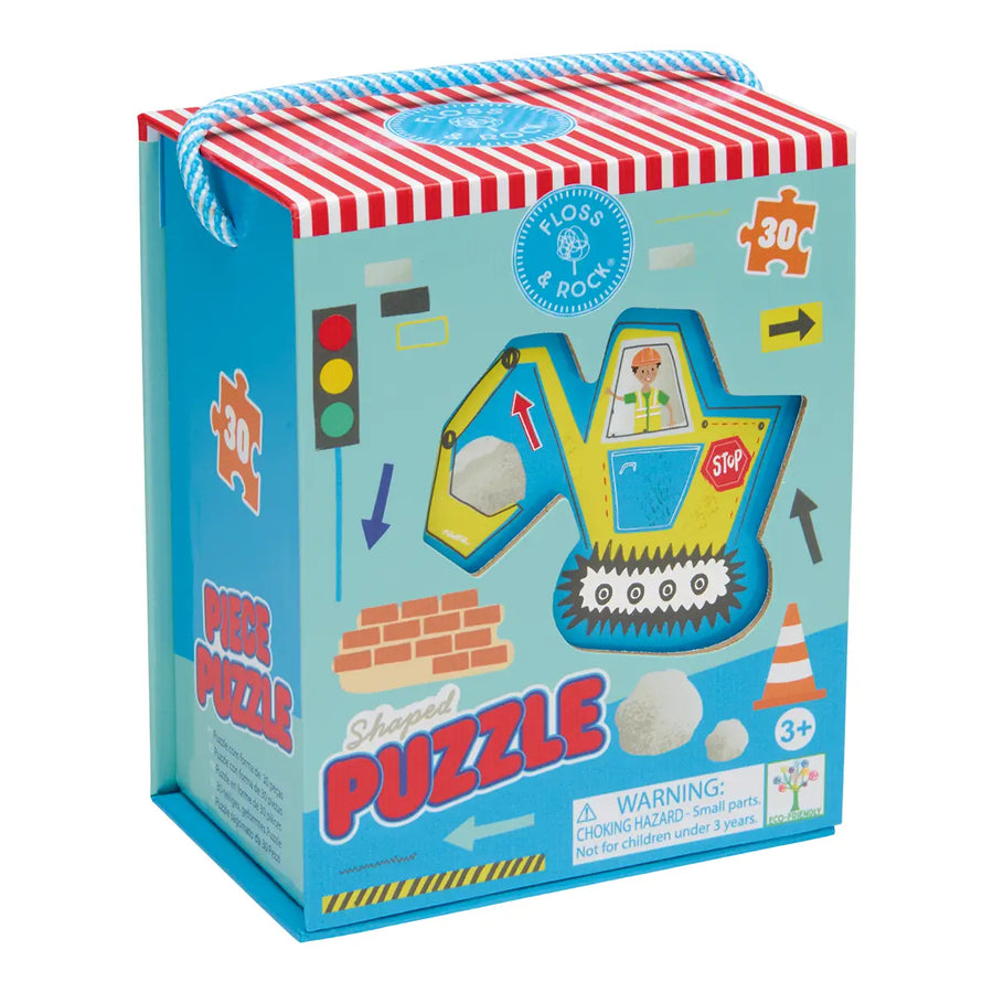 Children's puzzle packaging with a blue and red design featuring a construction-themed puzzle piece.