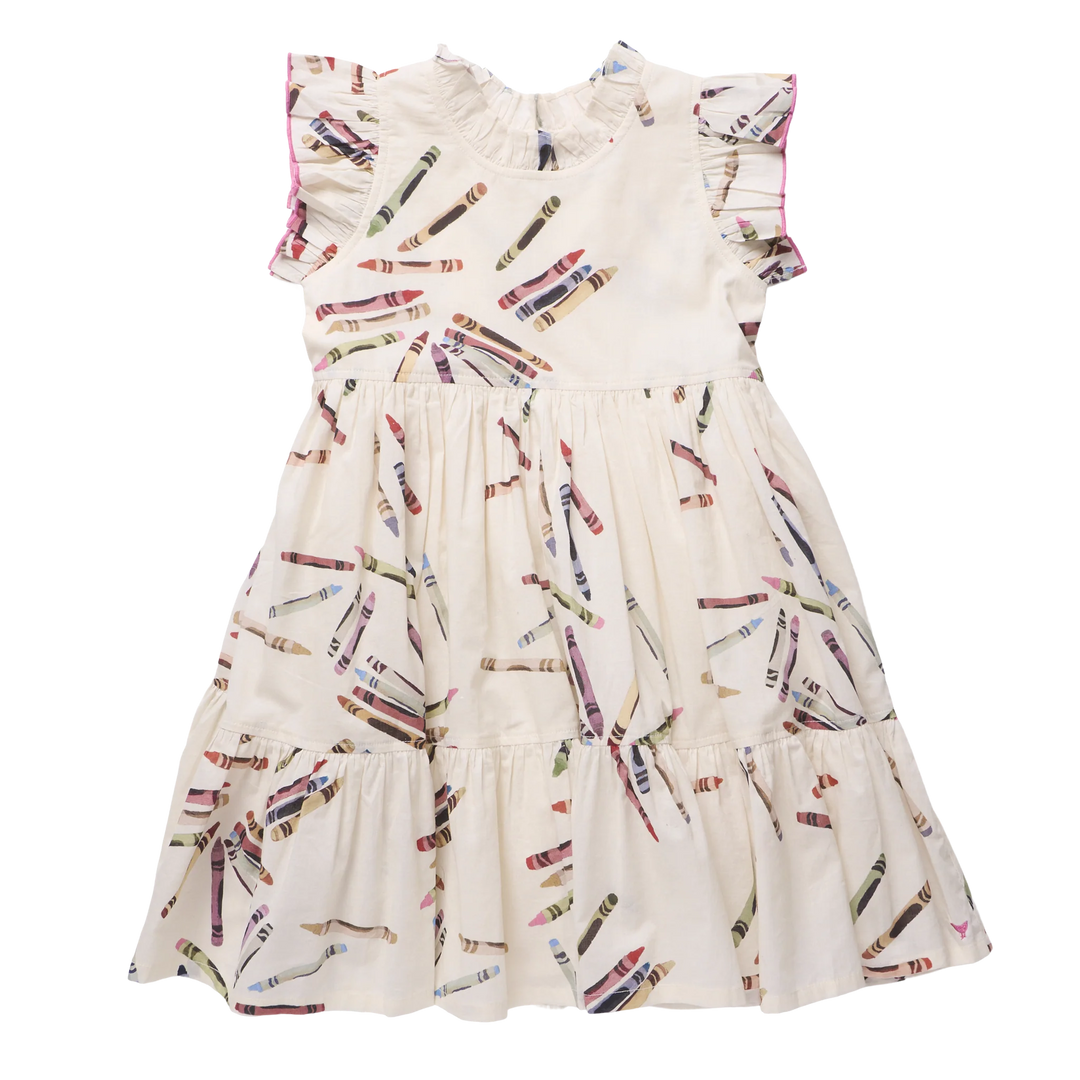 A tiered baby girl's dress in cream with an all-over crayon print, featuring ruffled cap sleeves and a ruffled neckline.