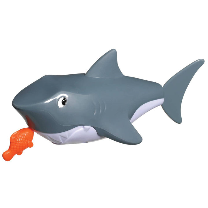 plastic gray shark toy that has an orange fish in its mouth. you pull the fish and it swims. 