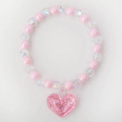 pink beaded elastic bracelet with pink glitter heart at the center of the bracelet