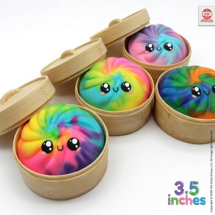 Colorful tie-dye products with cute faces in wooden containers on a white background