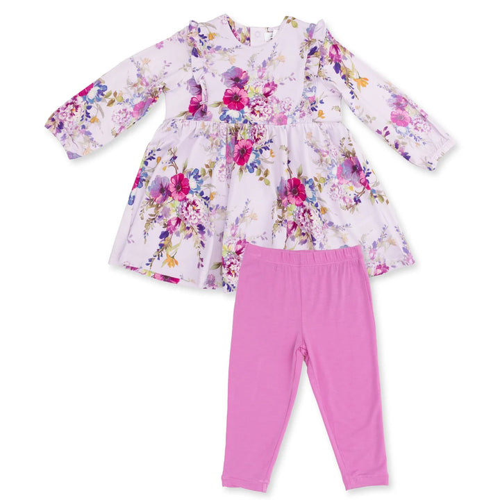 A toddler girl's two-piece outfit set featuring a long-sleeve floral dress in light pink and purple tones, paired with solid bright pink leggings, laid flat on a white background.