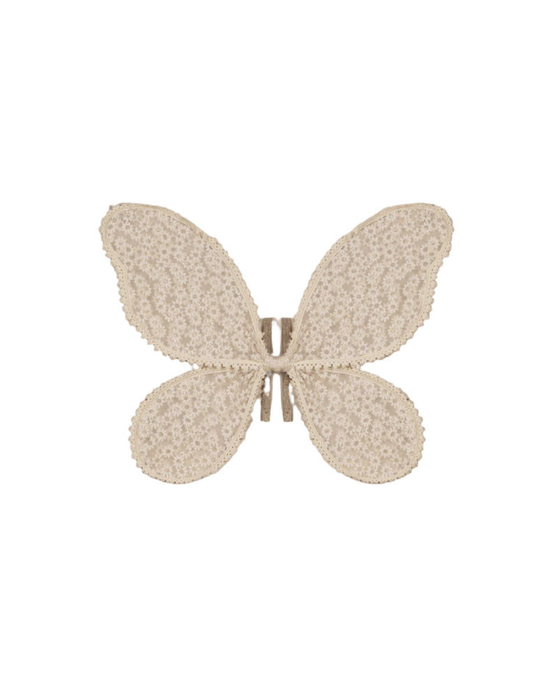 Butterfly wings with daisy embroidery in the center of the wings. Beige cream color. 