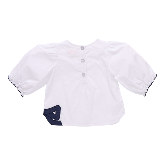 White baby shirt with navy accents 