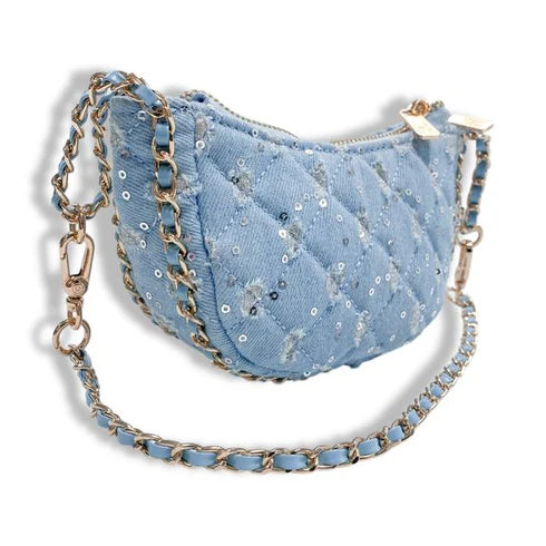 Blue sequined handbag with a gold chain strap on a white background
