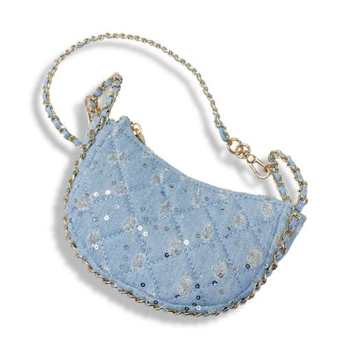 Blue sequin handbag with gold chain strap on a white background