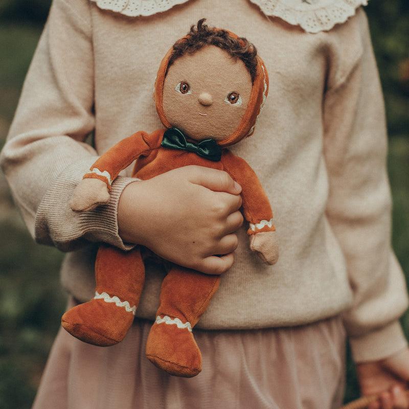 baby doll dressed as a gingerbread cookie 