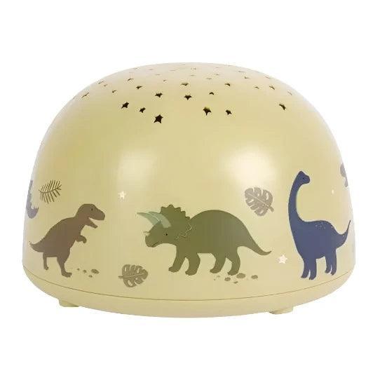 green projector light with dinosaurs all around it. Little star cut outs on the top of it. 