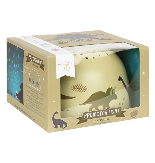 Dinosaur projector light, green base with dinosaurs around it. in the retail packaging