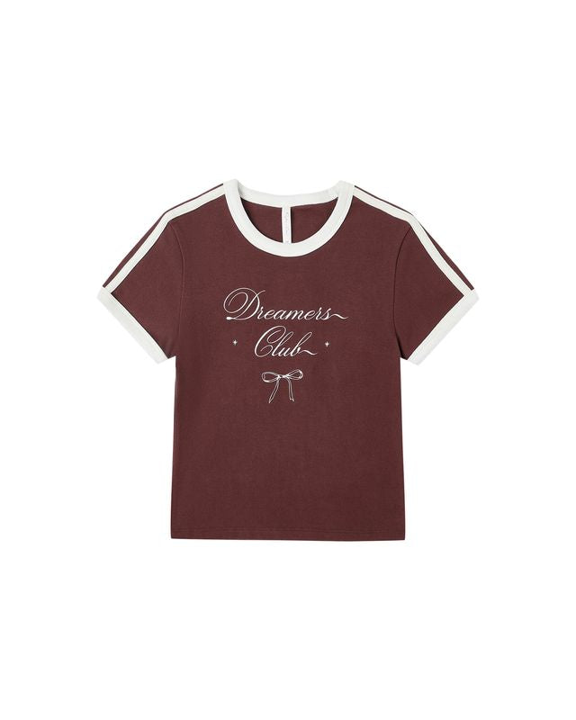 burgundy t-shirt with 'Dreamers Club' text on a white background