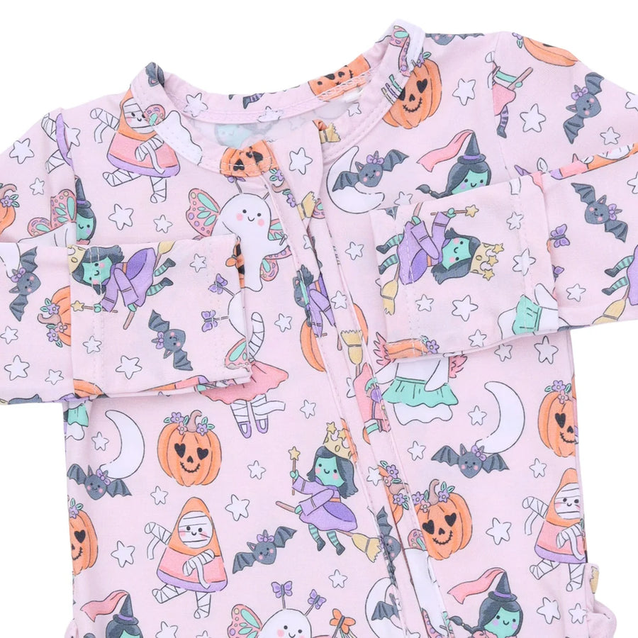 A light pink baby long-sleeve romper with a colorful Halloween-themed print featuring pumpkins, witches, ghosts, bats, and stars.