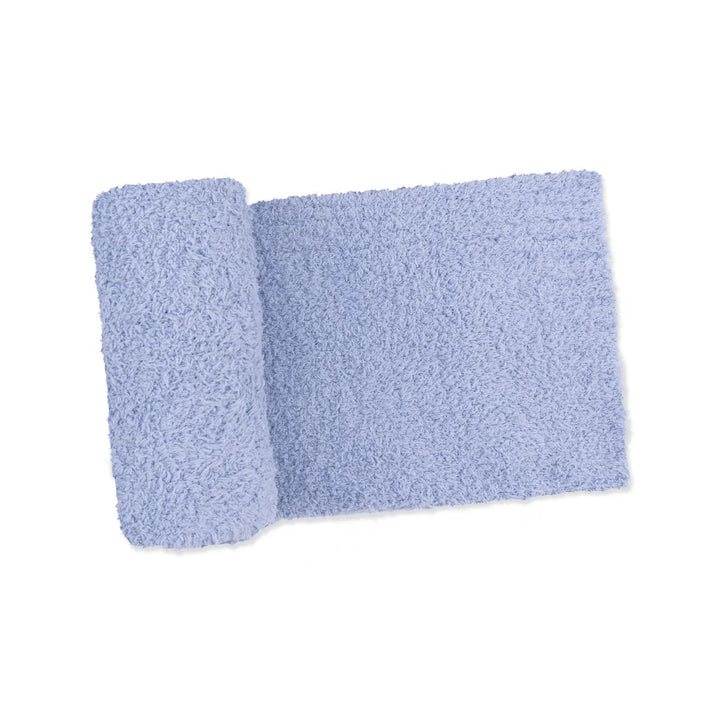 A light blue chenille blanket partially rolled on the left, displayed on a clean white background.