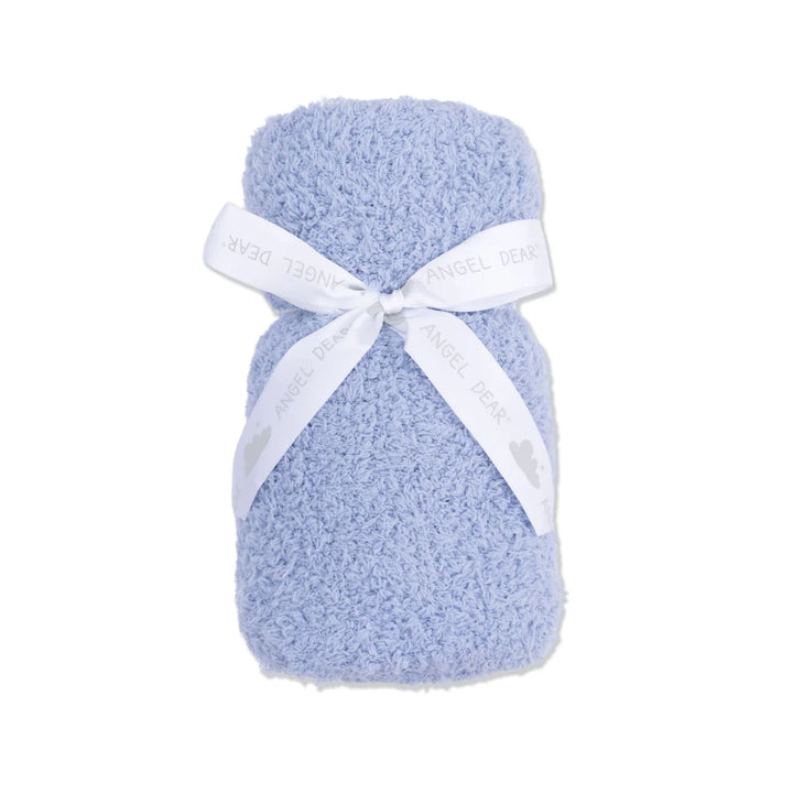 Blue chenille blanket with a white ribbon on a white background