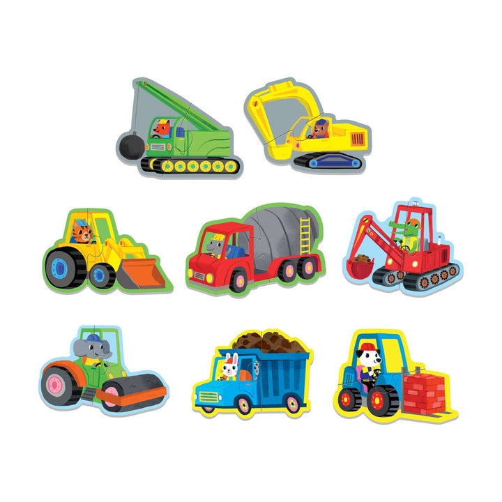 Set of colorful toy construction vehicles on a white background