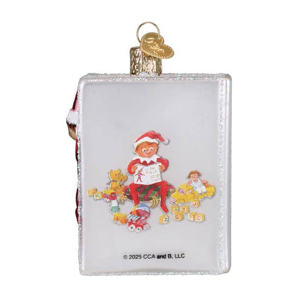 Christmas ornament with a child in a Santa hat and teddy bears on a white background