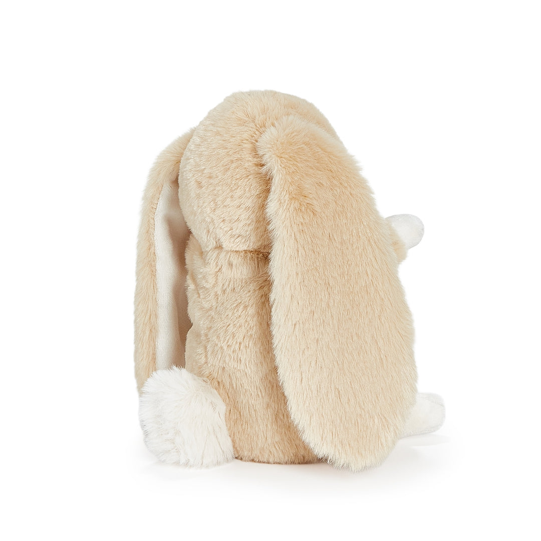 Beige plush toy with long ears on a white background