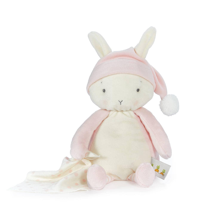 white bunny with pink hat and and pink arms and legs. white blanket with pink spots on it. 