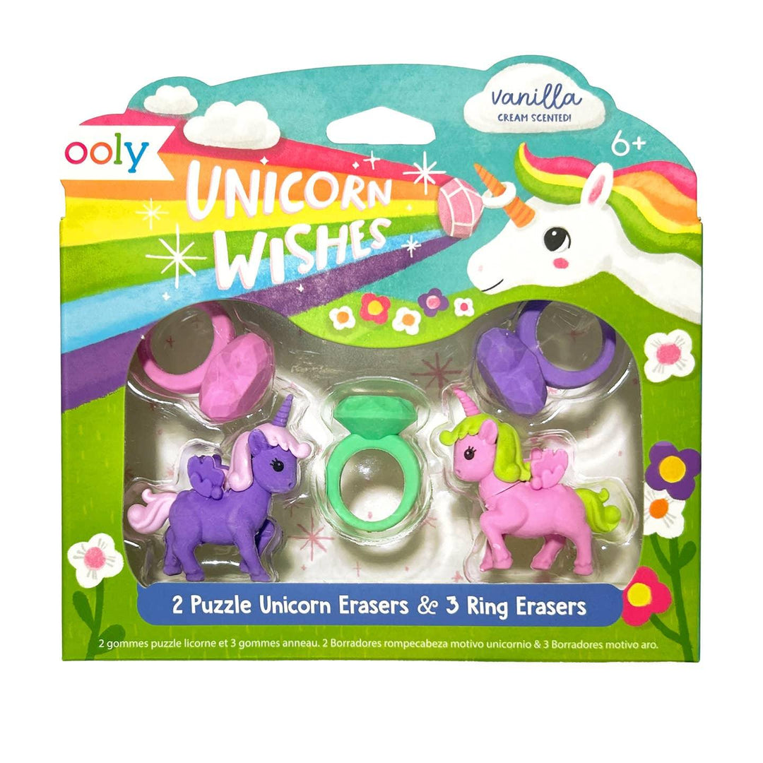 pencil erasers shaped like diamon rings and unicorns. 
