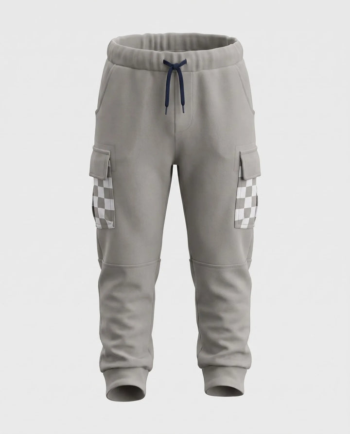 Light gray cargo jogger pants with a navy blue drawstring, side cargo pockets, and checkerboard patterned accents on the upper leg pockets, shown against a light gray background.