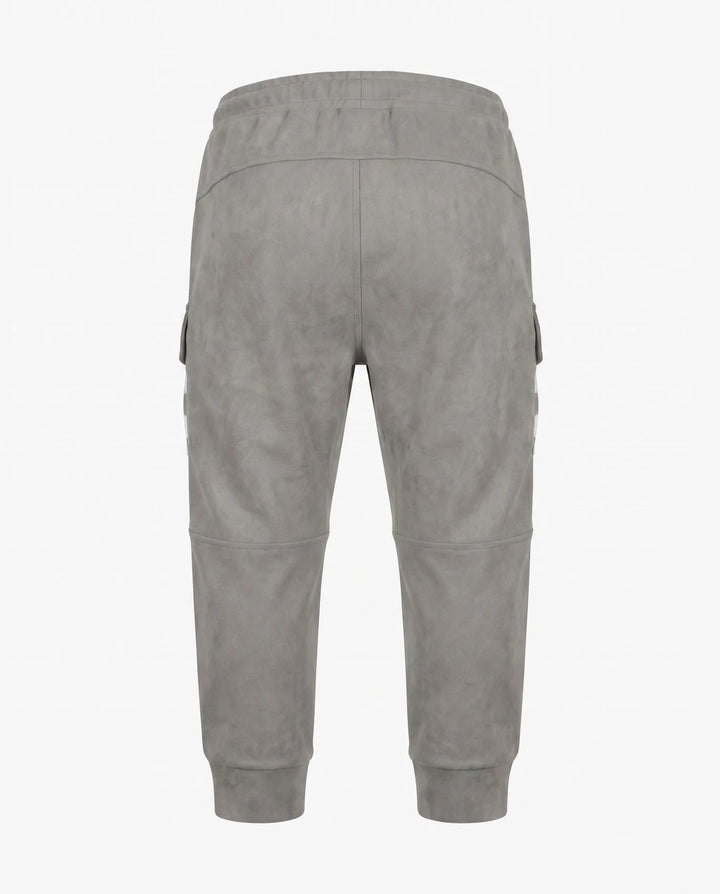 A pair of light gray jogger pants shown from the back, featuring an elastic waistband, side cargo pockets, and ribbed ankle cuffs, photographed against a plain white background.