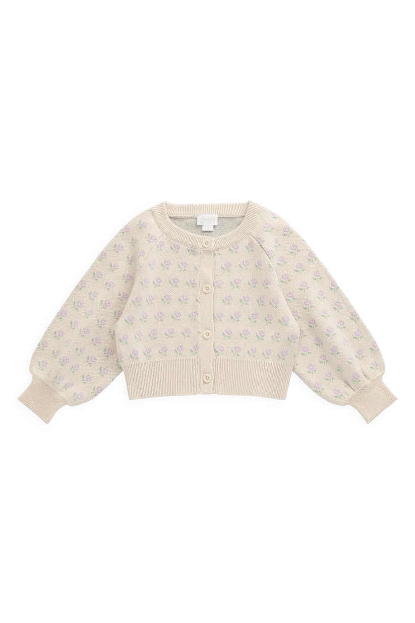 Beige cardigan with floral pattern on a white background