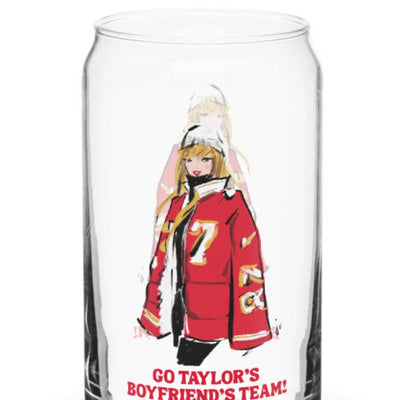 beer glass shape with a drawing of Taylor Swift in a red puffer coat with her boyfriend's jersey number on it. 