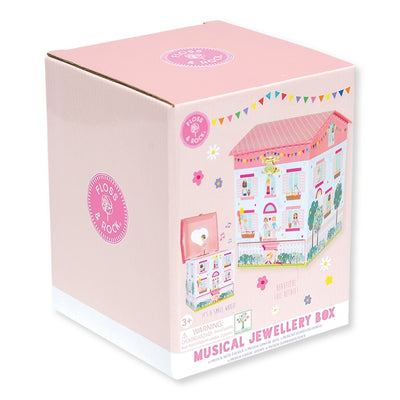 this picture shows the dollhouse packaging. a shiny box with the dollhouse picture on the outside. 