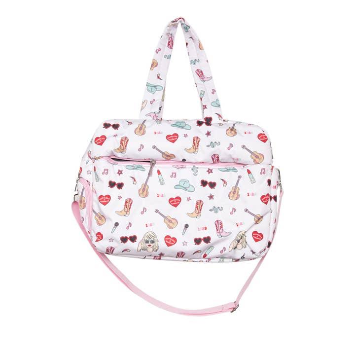 Taylor Swift inspired duffel bag with Taylor Swift inspired icons all over the bag. shoulder strap and detachable pink strap