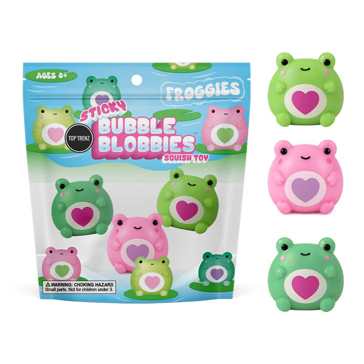 Frog-shaped squish toys with heart designs on packaging