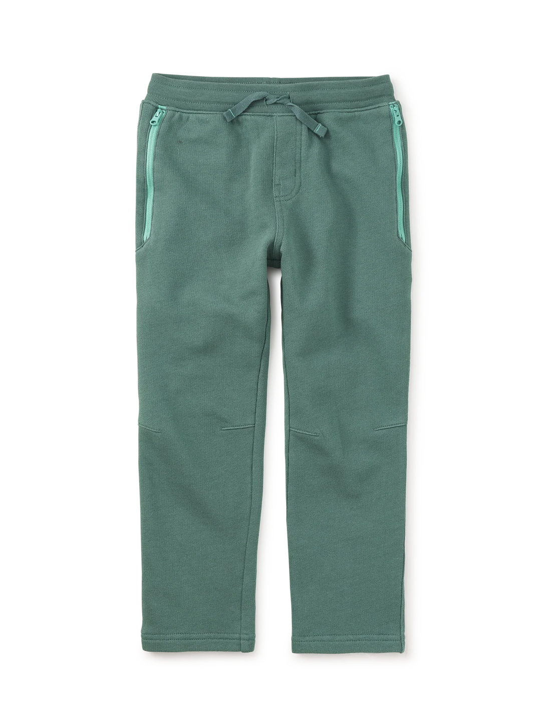 A pair of sage green fleece pants with a drawstring waist and zippered side pockets, shown flat on a white background.