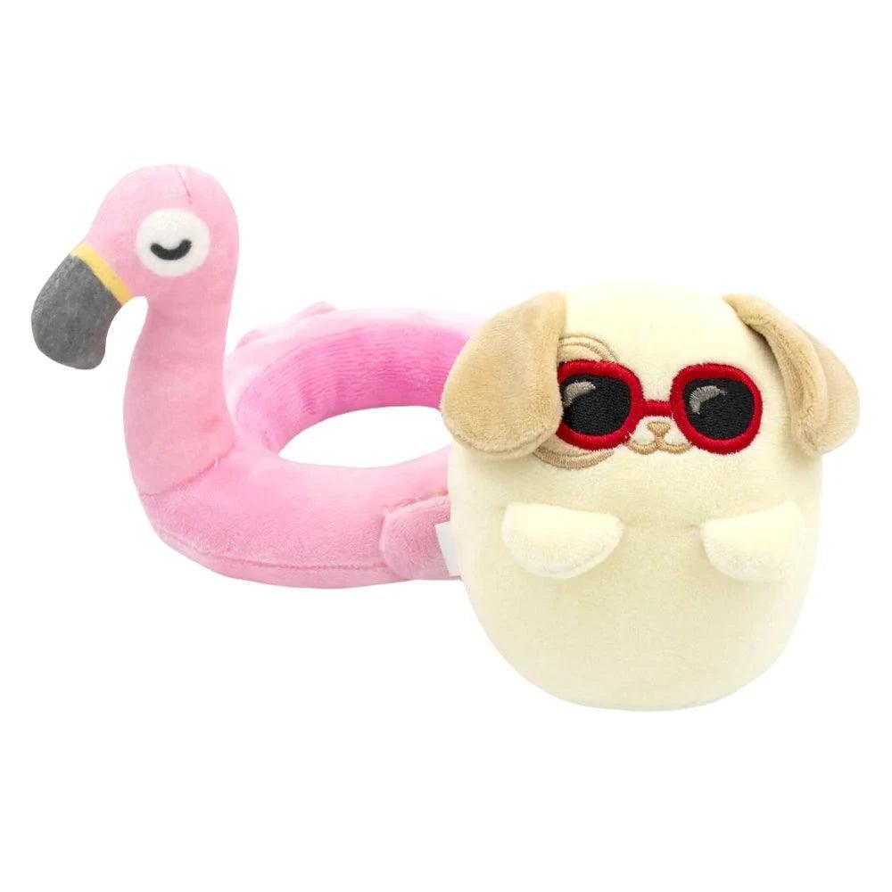 small squishy puppy and a flamingo pool float- both are detachable and small.  