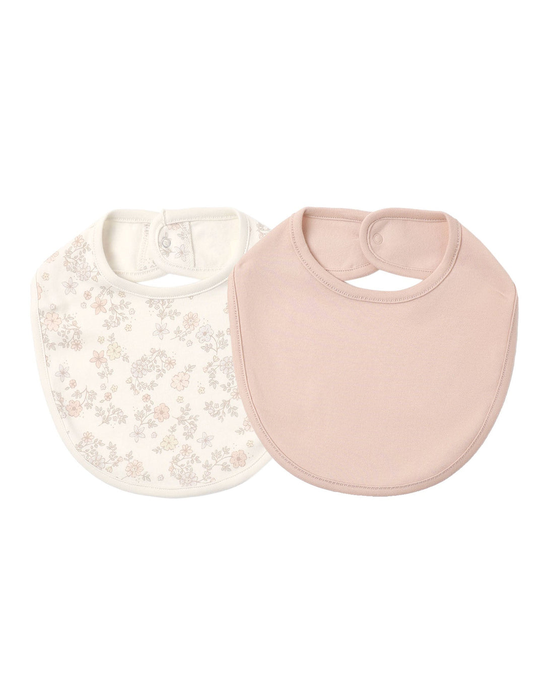 Two baby bibs on a plain white background, one in soft blush pink and one in off-white with a delicate floral pattern.