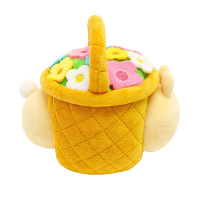 Bunny plush toy fits inside this basket adorned with tiny flowers. This is a sideview