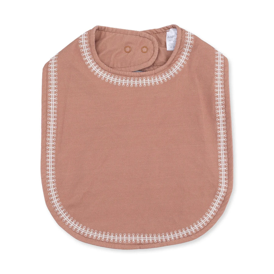 A brown baby bib with white embroidered borders, shown flat against a white background.