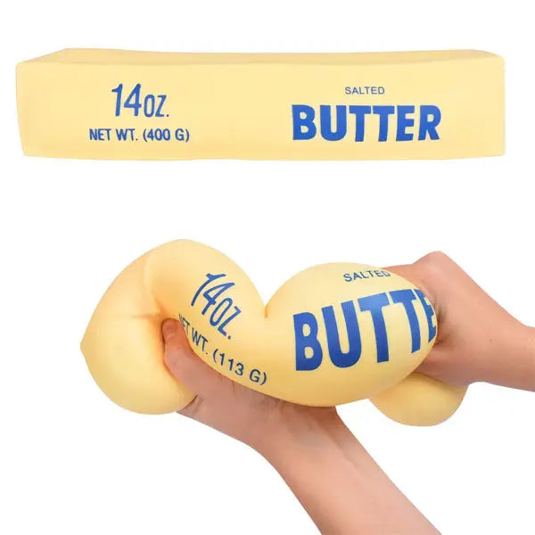 Two yellow blocks labeled 'Butter' held by a hand against a white background
