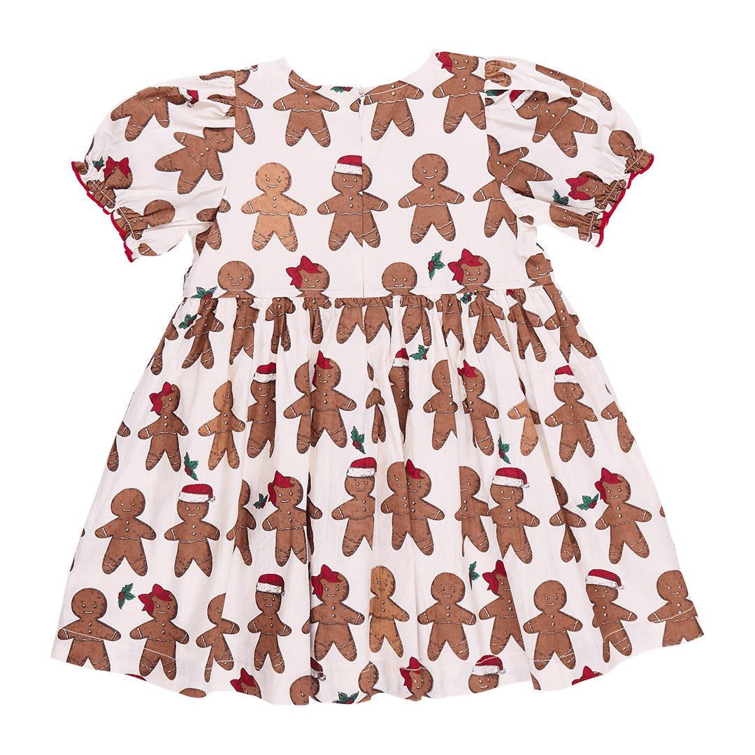 back of gingerbread dress with hidden zipper. gingerbread boys and girls all over the dress. 
