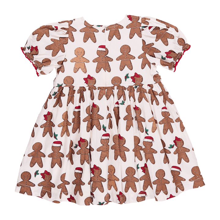 back of gingerbread dress with hidden zipper. gingerbread boys and girls all over the dress. 