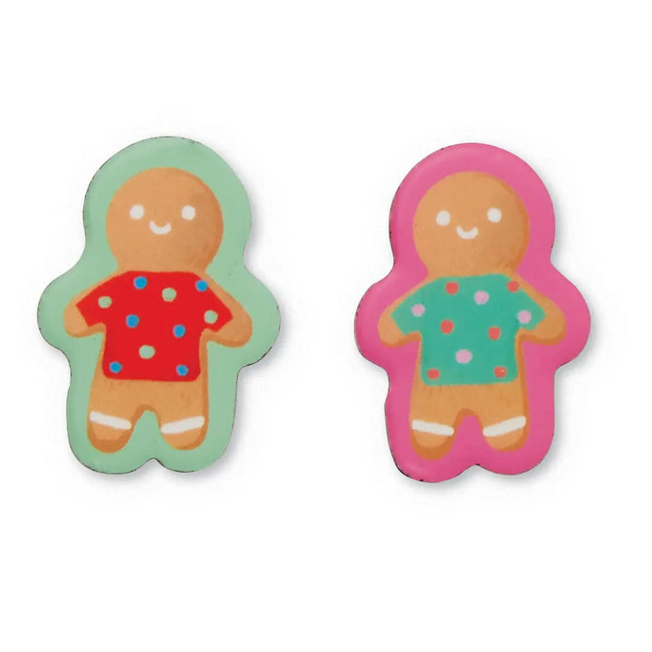Two gingerbread person-shaped items on a plain white background, one outlined in mint green with a red shirt and blue and pink polka dots, and the other in pink with a green shirt and orange and pink polka dots.