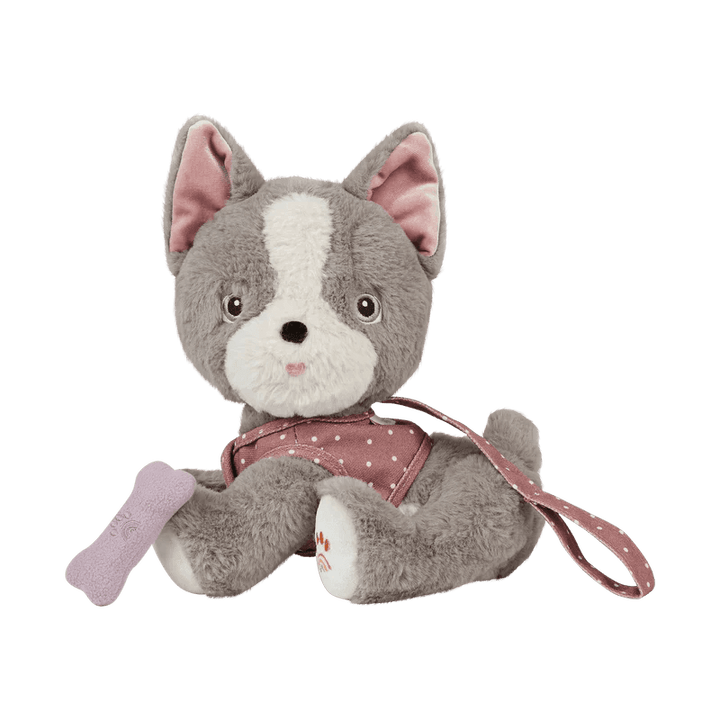 gray and white stuffed animal dog with a puppy face. dusty rose lead with a bone that attaches to his mouth.