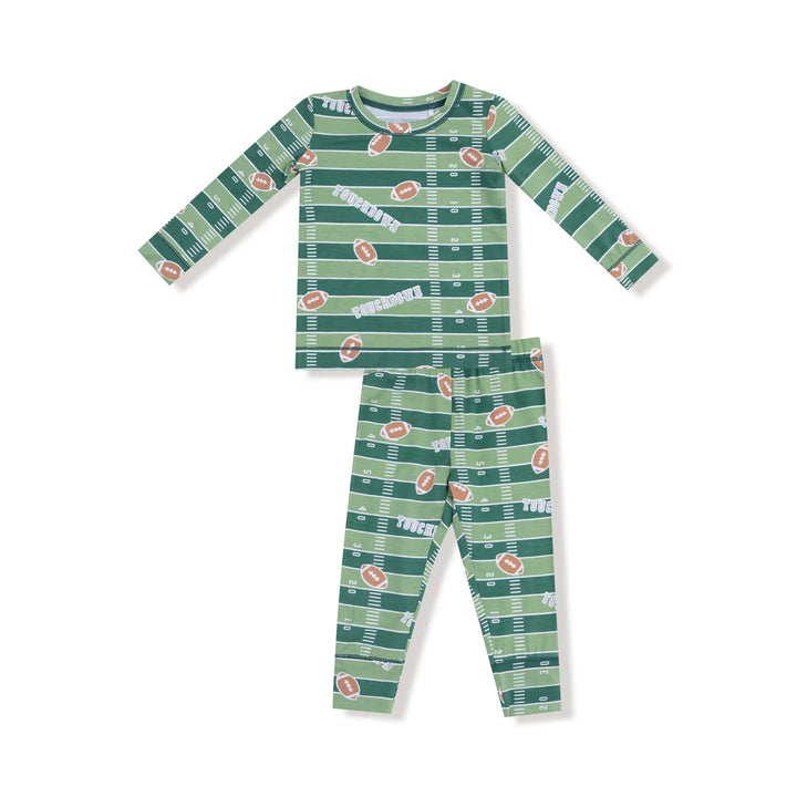 Green pajama set with football pattern on a white background