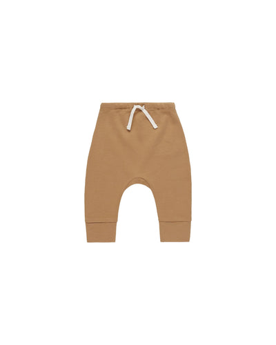 Baby boy bottoms, drawstring at the top in a golden color. 