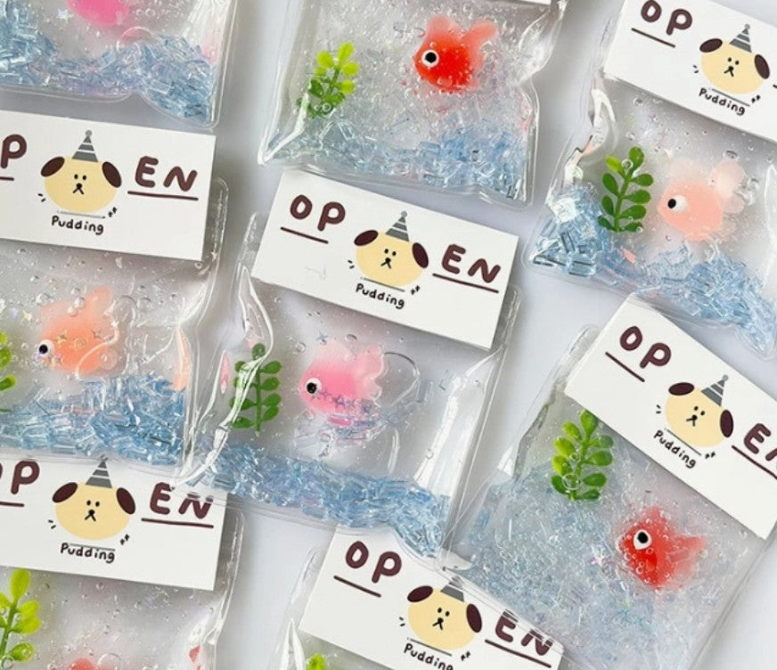 squish packages with mini goldfish in different colors 