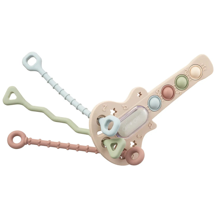 Pastel-colored guitar  sensory toy on a white background