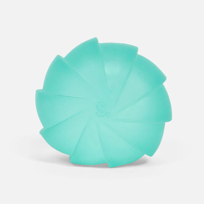 Teal squish ball on a white background
