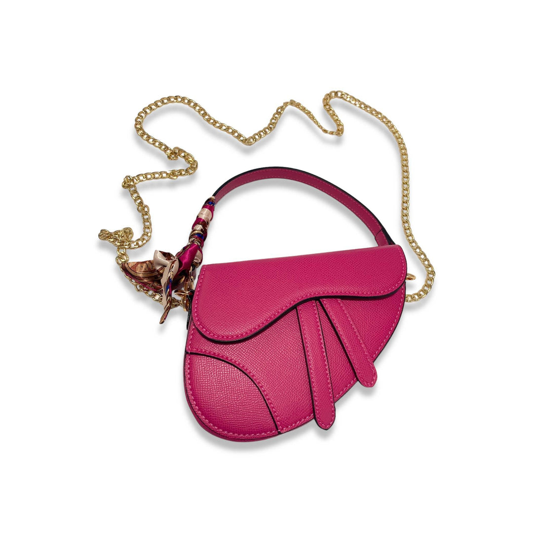 saddle bag in fuschia color with scarf on the strap, detachable gold chain and snap closure on the flap. 