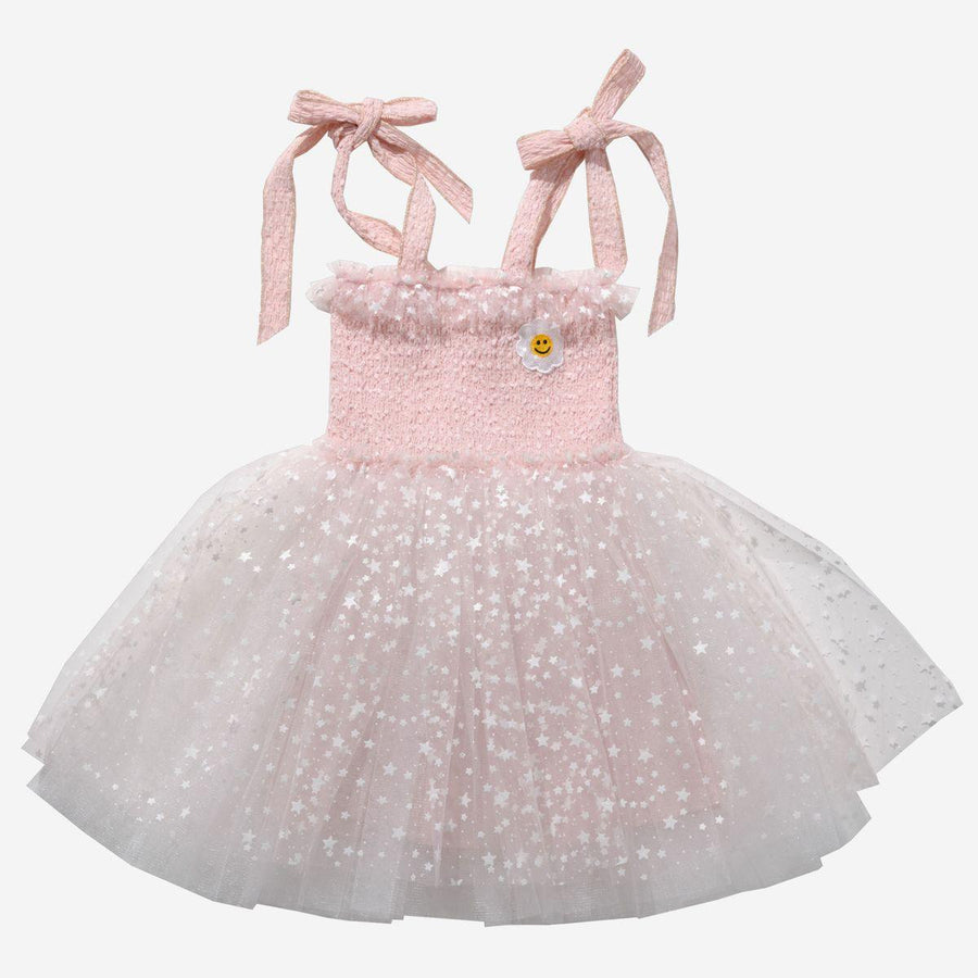pink spaghetti strap dress with white tulle for the skirt. the tulle has stars on it. straps tie at the shoulder 