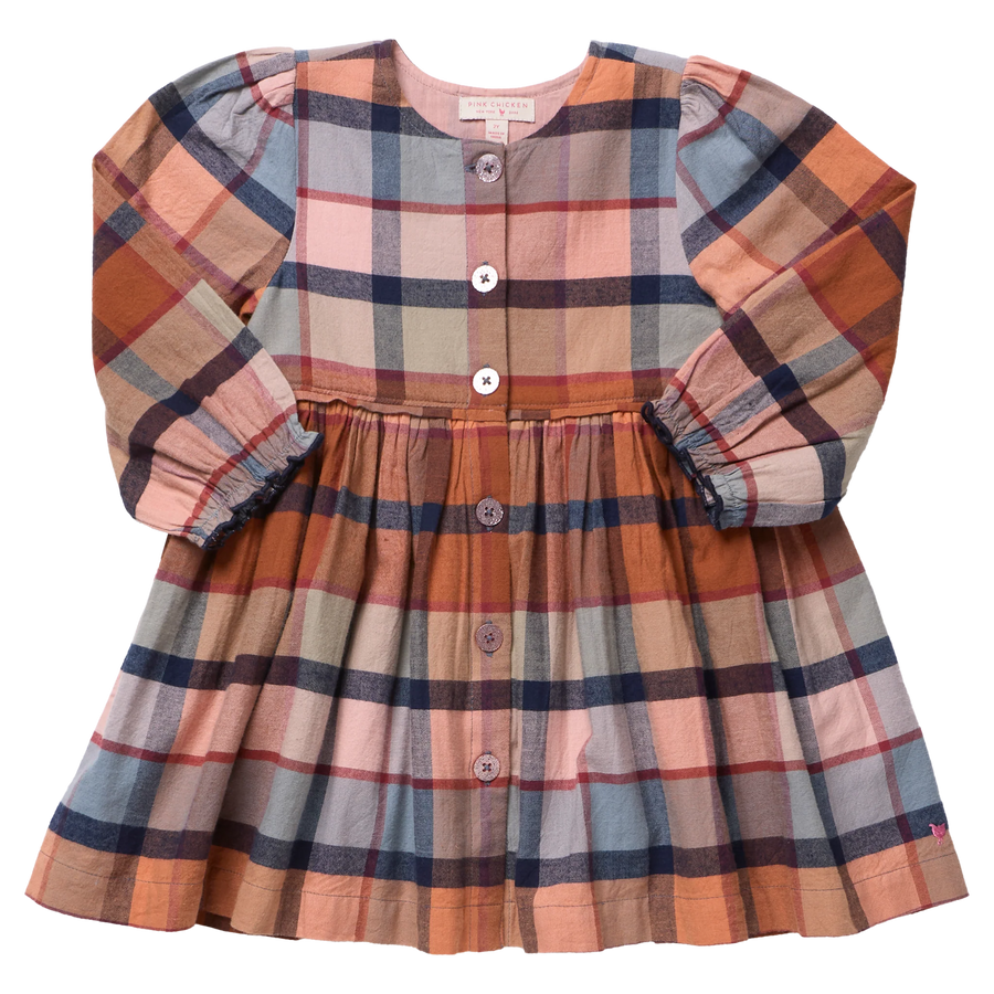 girls rust plaid dress with blue accents. long sleeves and buttons down the front. 