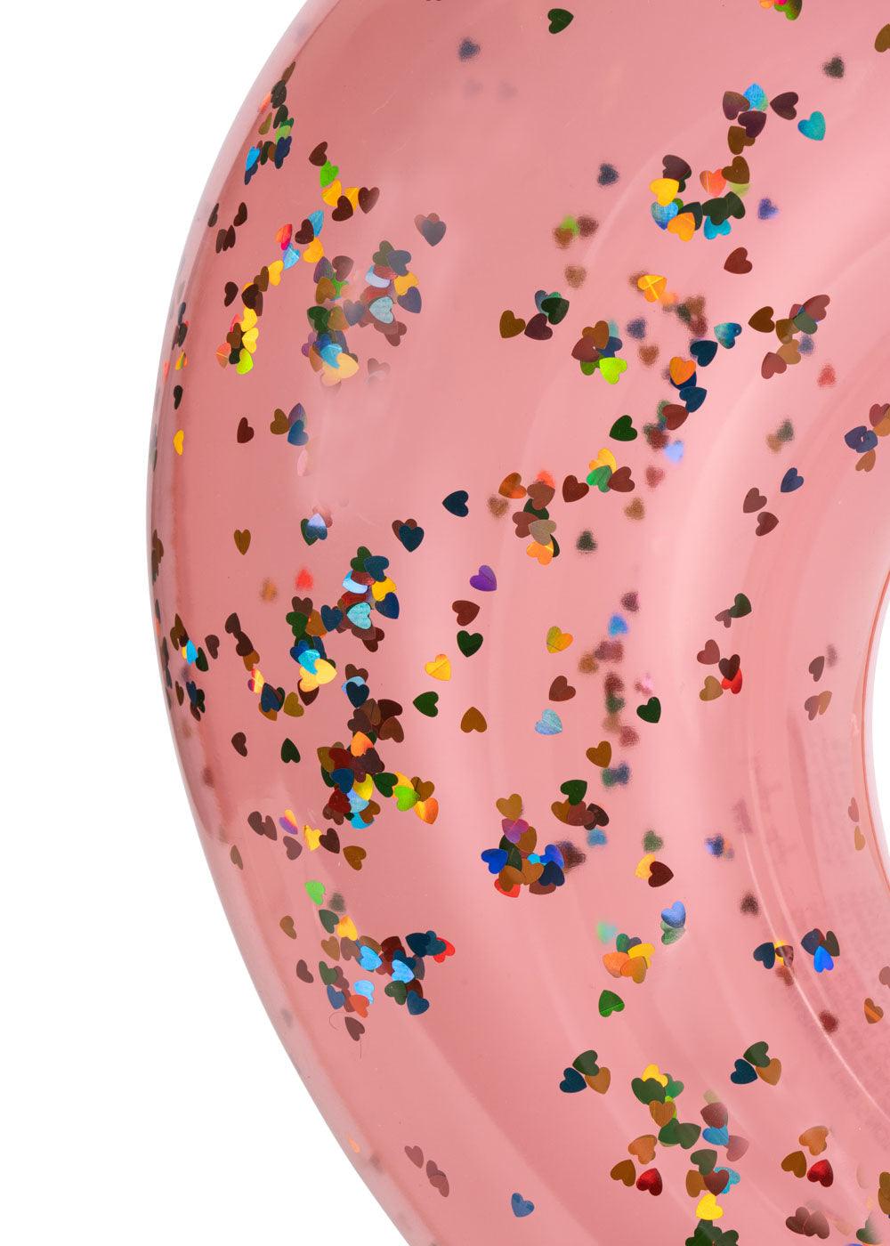 close up on the water float and the confetti inside. 